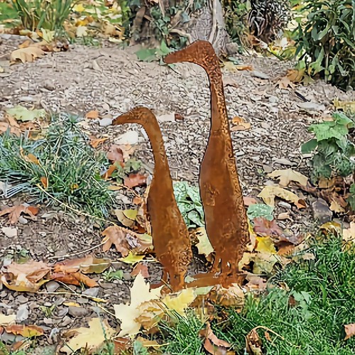 Pair rusty metal indian - rusty,